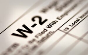 close up of a paper with a letter and numbers - Could You Benefit From a W-2 Checkup?