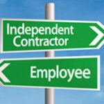 A green sign with white text - 7 Ways to Avoid Worker Classification Mistakes